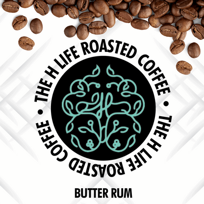 On a white textured background there are coffee beans spilling from the top and The H Life brain logo in the center. The H Life Roasted Coffee lineup highlighting the Butter Rum product.